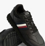 Tommy Hilfiger Mens Signature Tape Cleat Leather Trainers Black top view showing details and color accents.