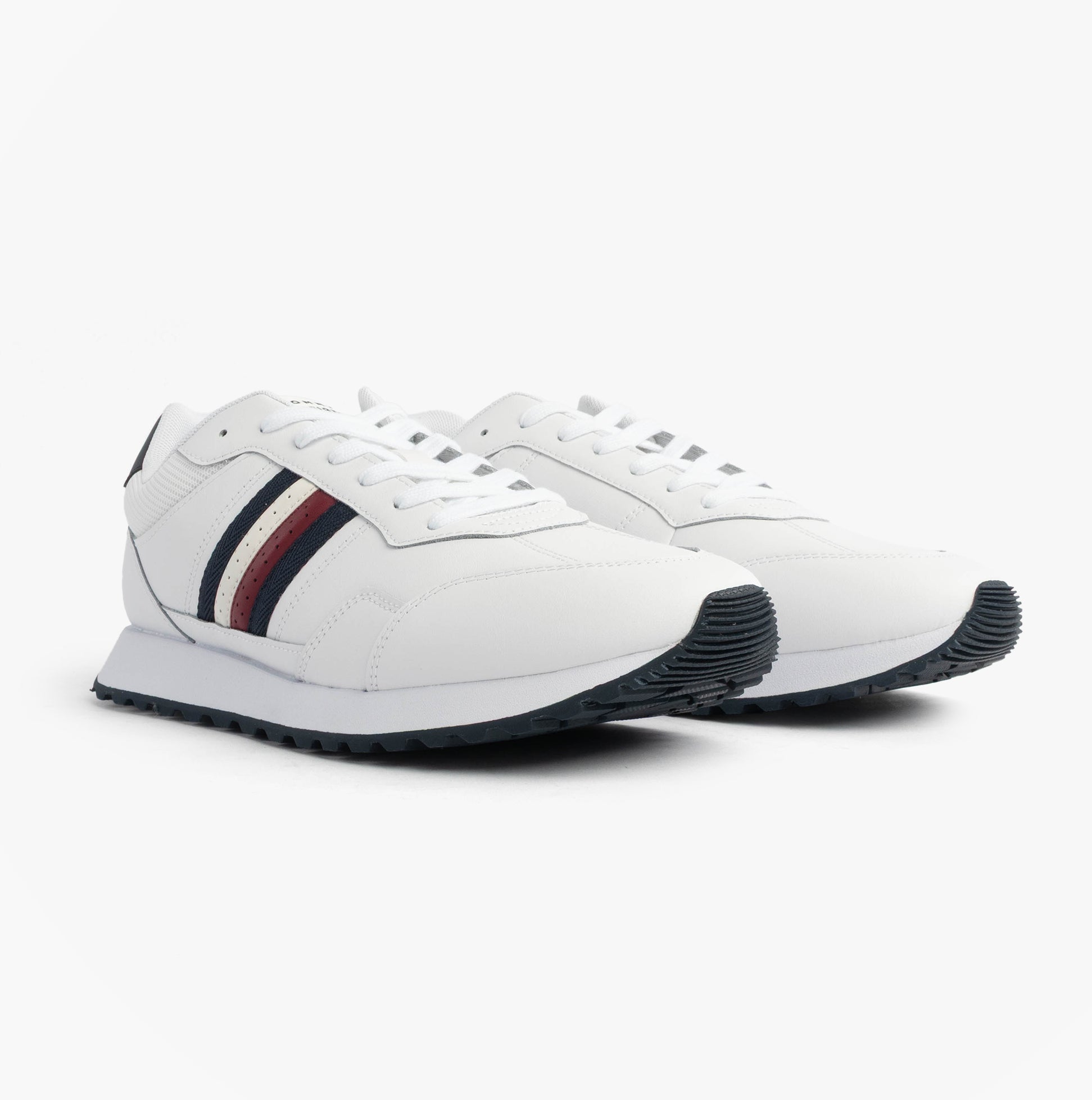 Tommy Hilfiger Mens Signature Tape Cleat Leather Trainers White side view showcasing sporty design and detailing.