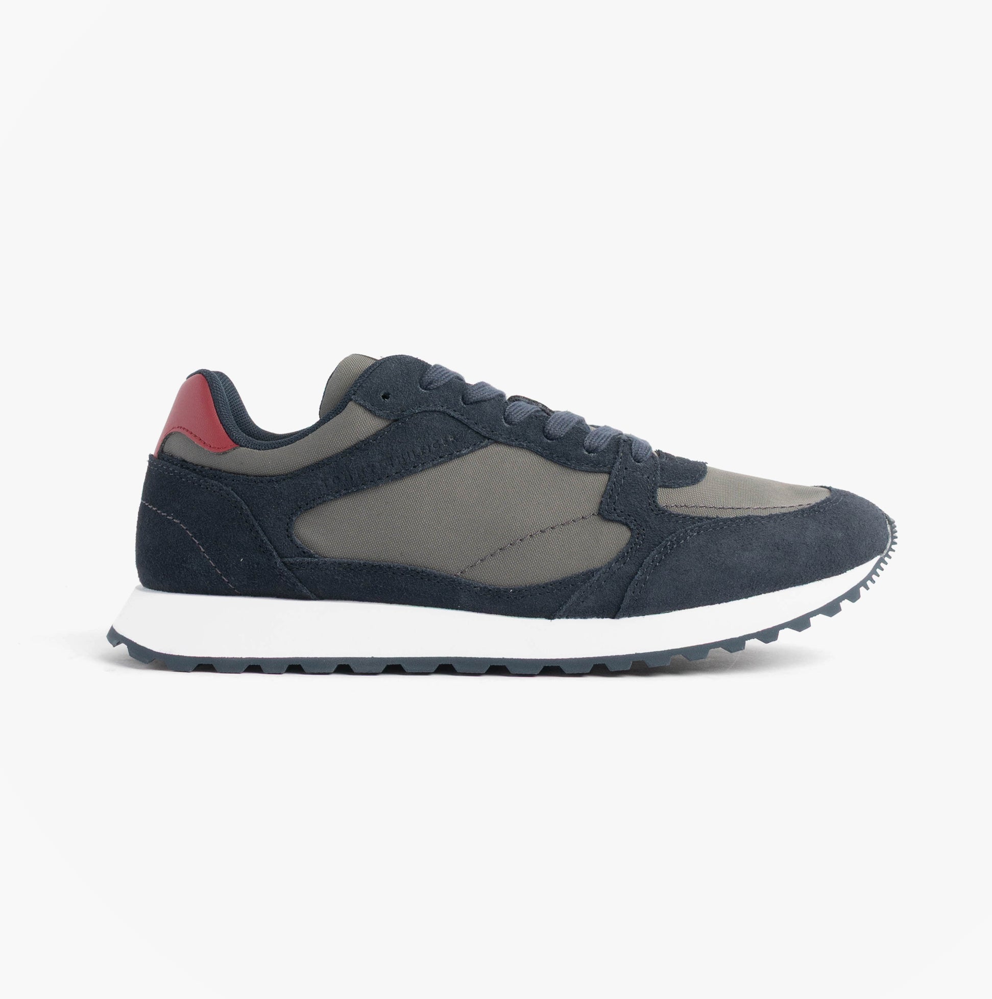 Tommy Hilfiger NEW RUNNER EVA MIX Mens Trainers Desert Sky side view showcasing navy leather and suede materials.