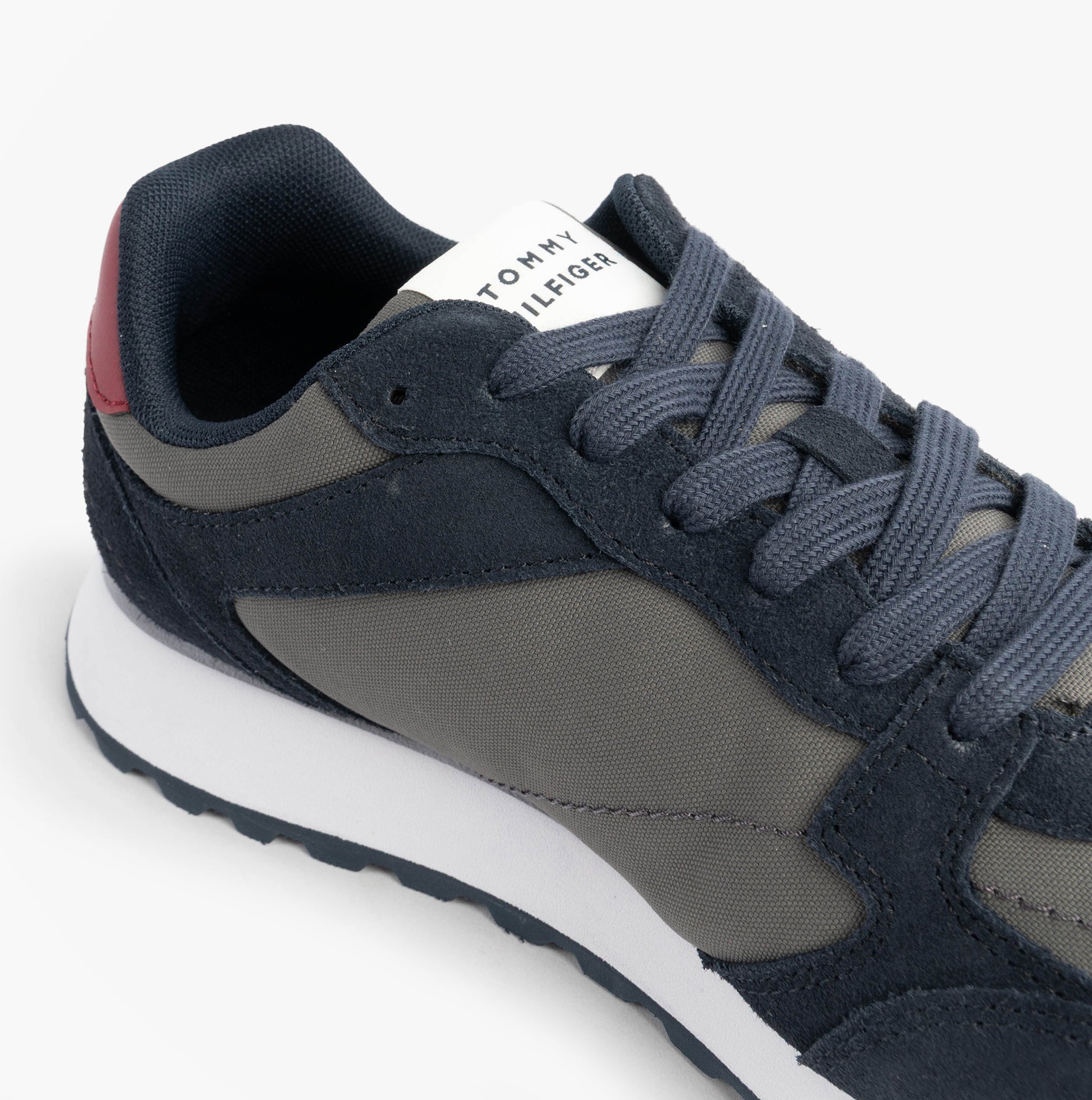 Tommy Hilfiger NEW RUNNER EVA MIX Mens Trainers Desert Sky side view showcasing the leather and suede upper design.