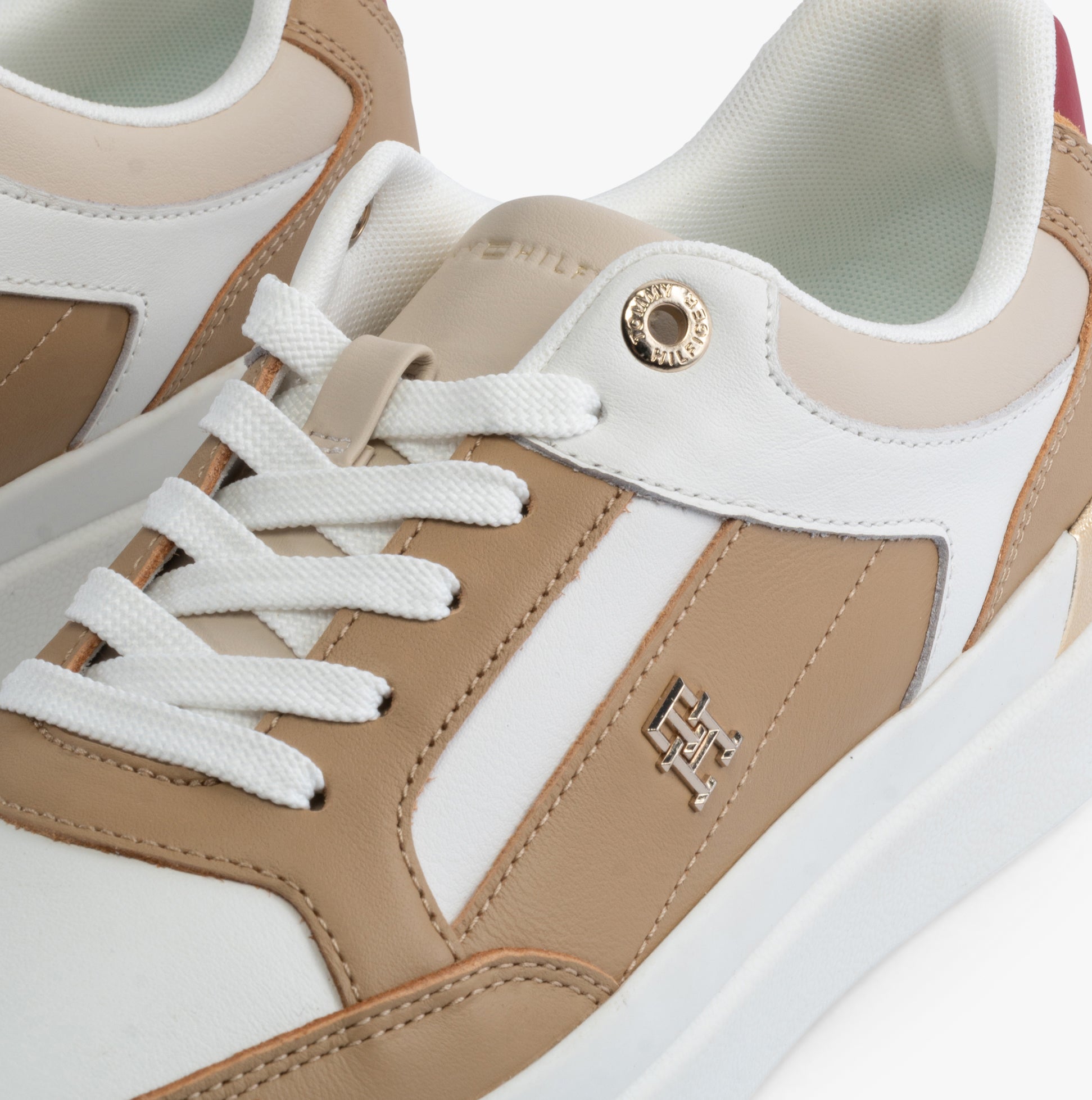 Tommy Hilfiger MONOGRAM METALLIC LEATHER Womens Court Trainers Classic Khaki front view showcasing round toe and lace-up design.