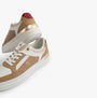 Tommy Hilfiger MONOGRAM METALLIC LEATHER Womens Court Trainers Classic Khaki side view with gold accents and red heel.