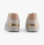 Tommy Hilfiger MONOGRAM METALLIC LEATHER Womens Court Trainers Ancient White rear view showcasing the gold accent and logo.