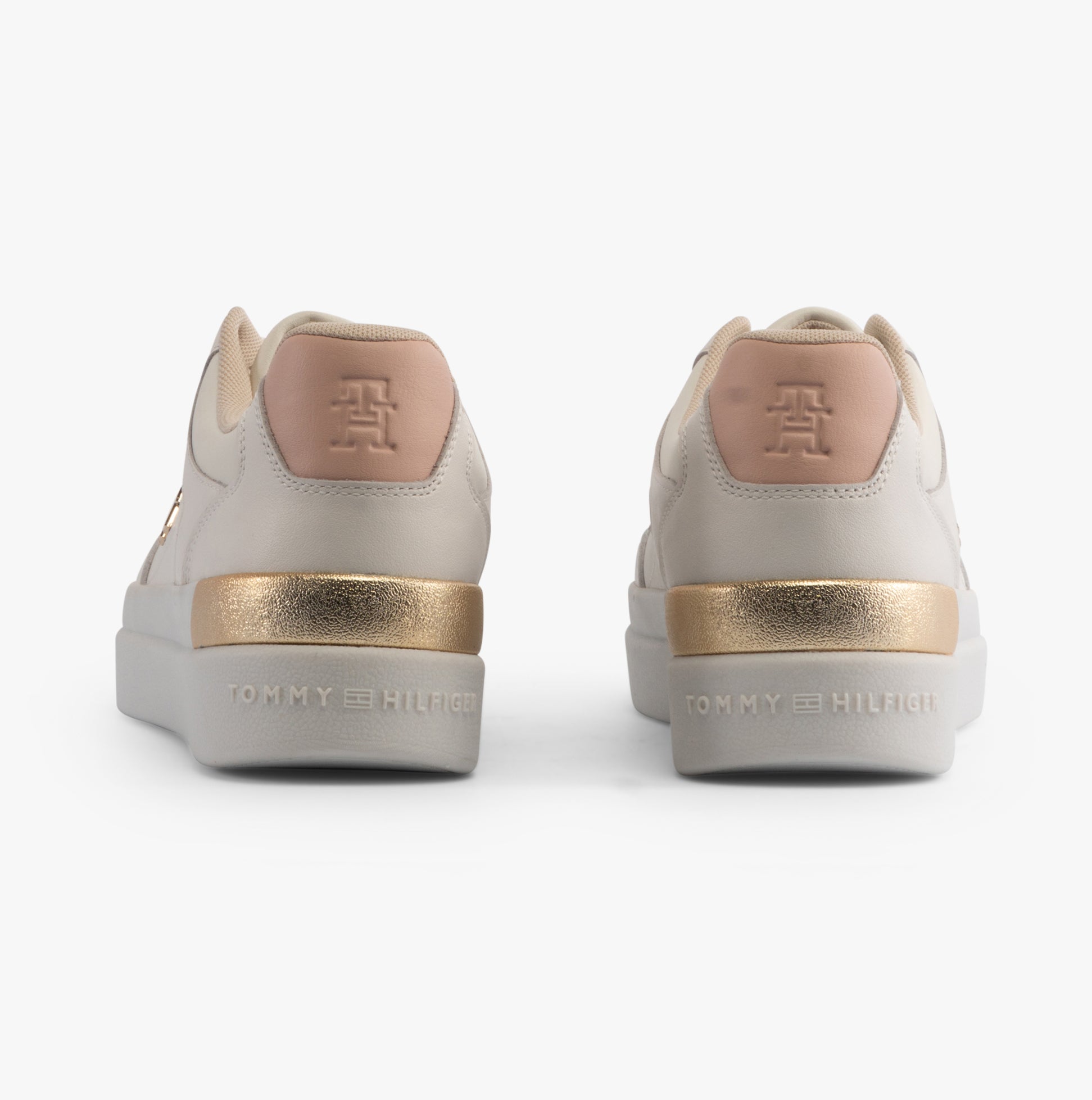 Tommy Hilfiger MONOGRAM METALLIC LEATHER Womens Court Trainers Ancient White rear view showcasing the gold accent and logo.