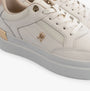 Tommy Hilfiger MONOGRAM METALLIC LEATHER Womens Court Trainers Ancient White detail view showcasing logo and side design.