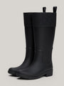 Tommy Hilfiger RUBBER Womens Long Boots Black side view showcasing knee-high design and pull-on features.