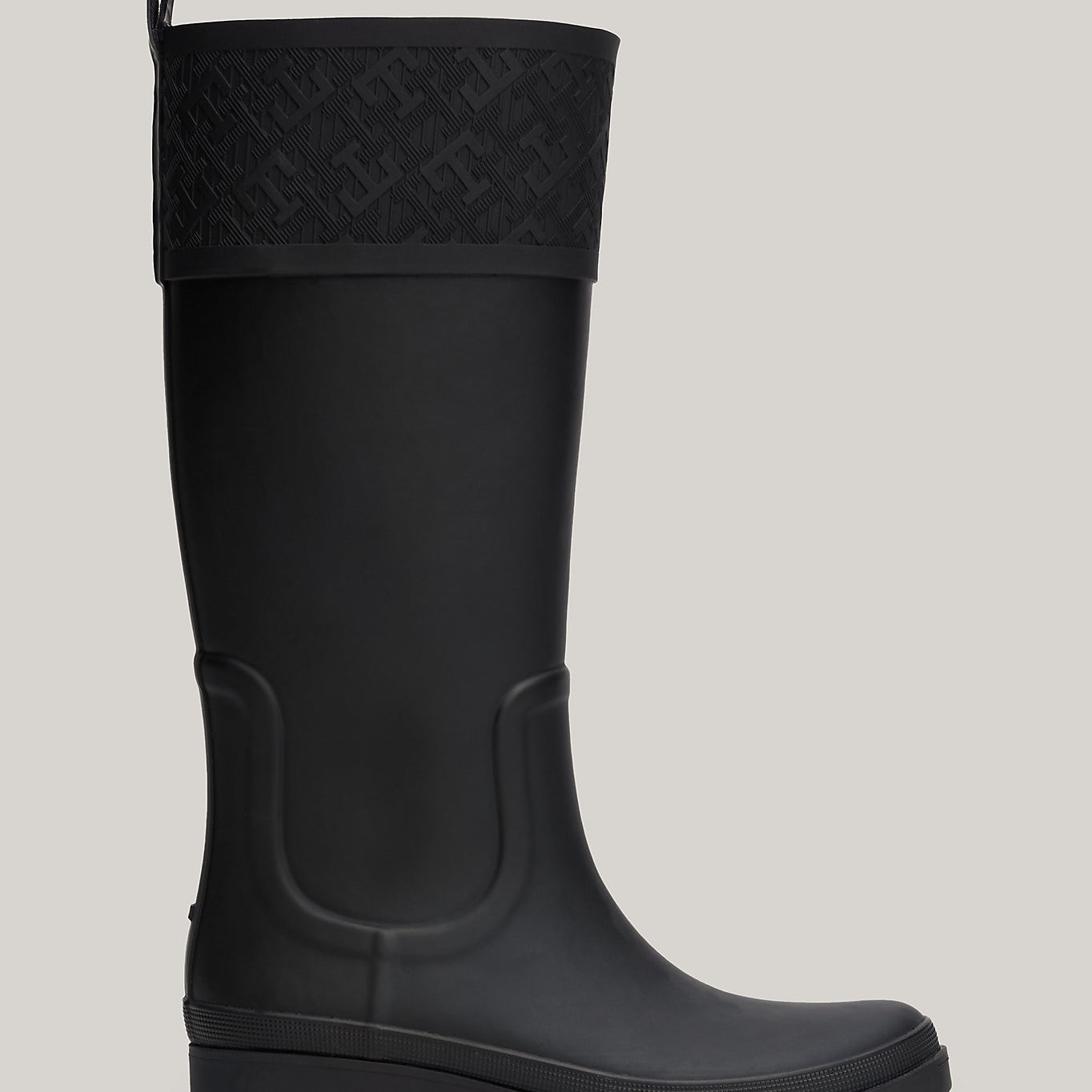 Tommy Hilfiger RUBBER Womens Long Boots Black side view showcasing the tall, waterproof rubber design and comfortable fit.