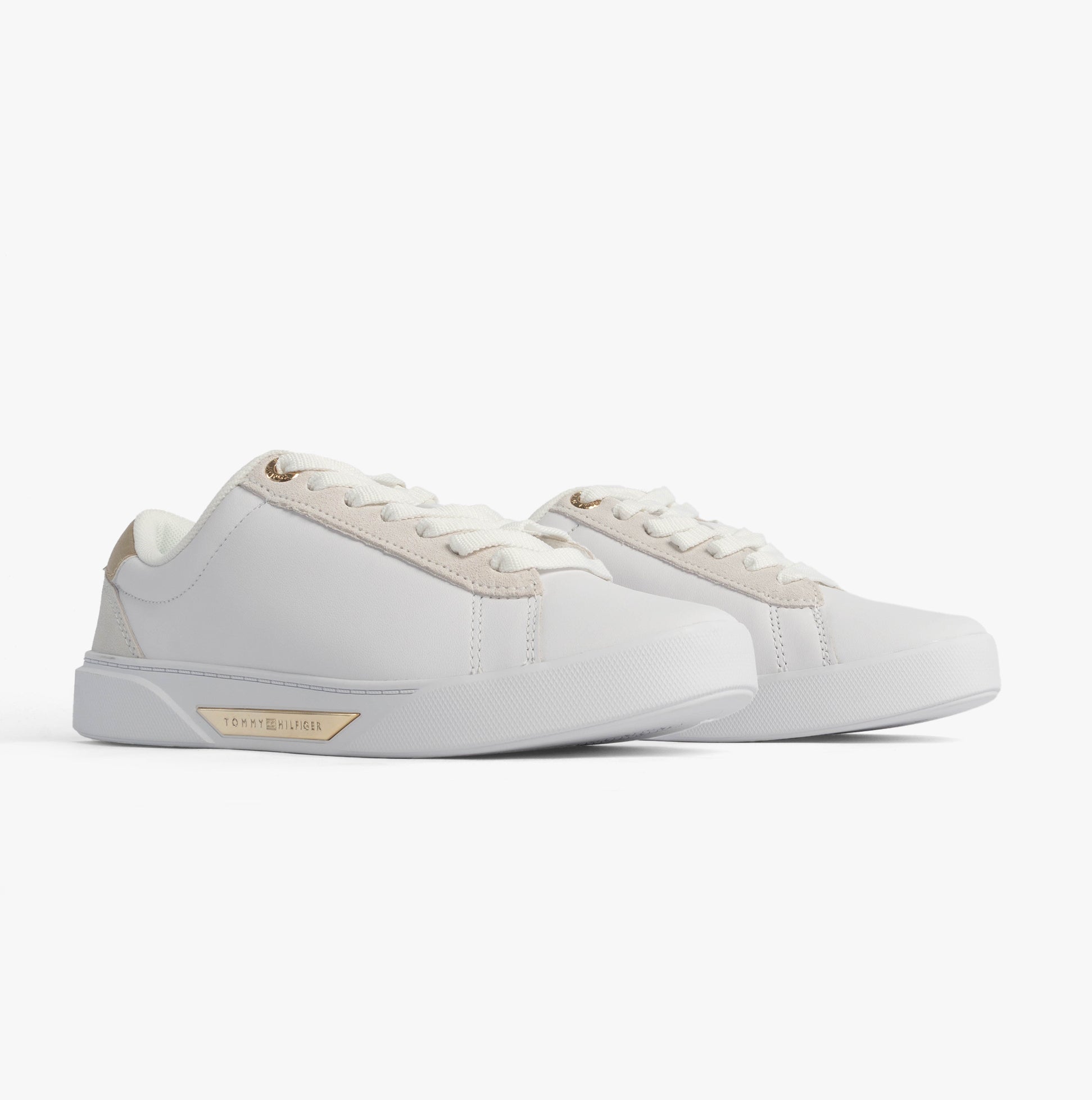 Tommy Hilfiger CHIC COURT Womens Trainers White side view showing casual leather upper and lace-up closure.