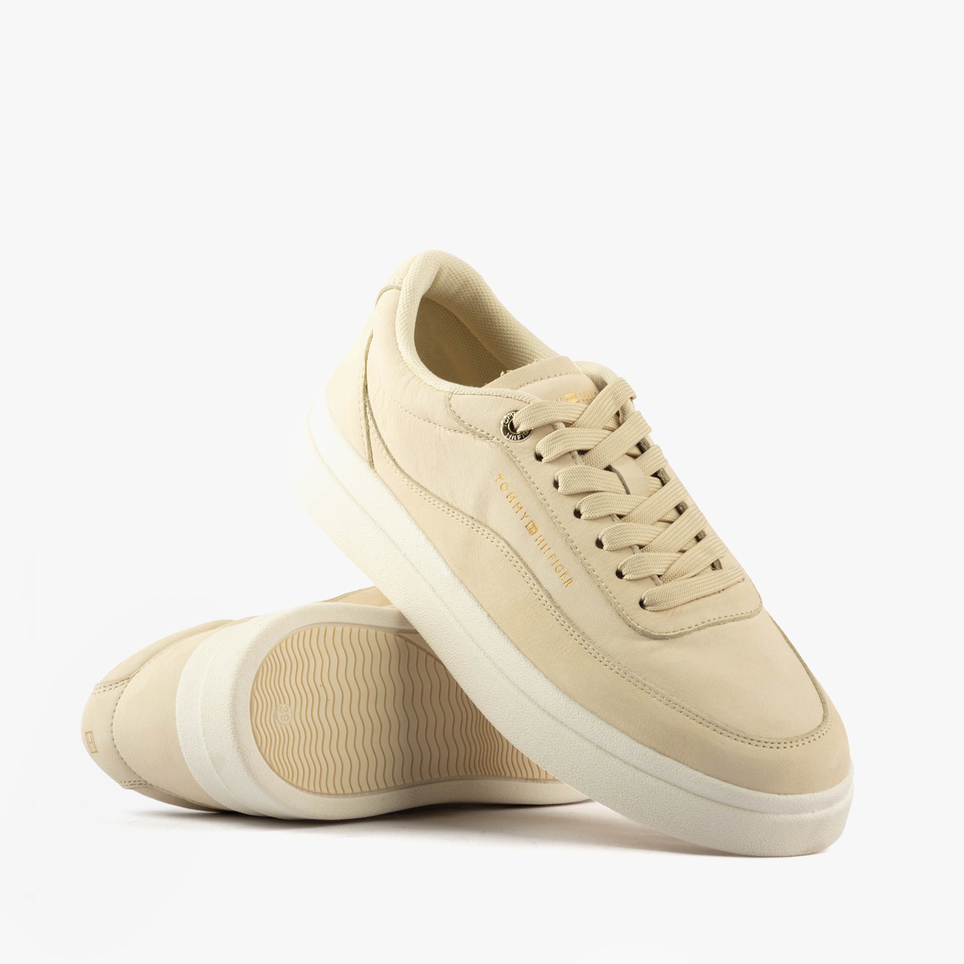 Tommy Hilfiger MODERN COURT SNEAKER Womens Muslin side view with light beige leather upper and lace-up closure.