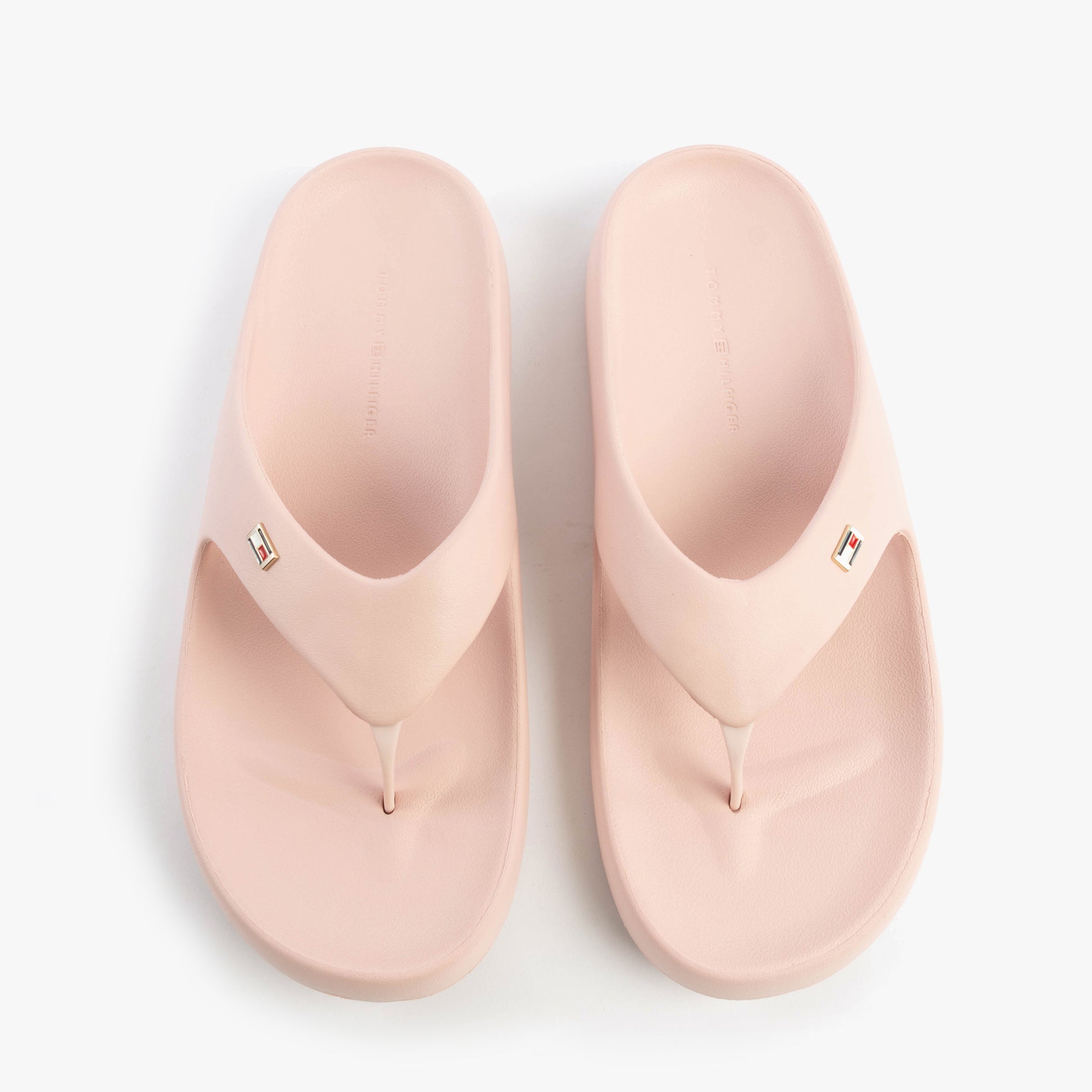 Tommy Hilfiger ENAMEL FLAG CONTOURED Womens Sandals Foggy Pink top view showcasing soft EVA material and slip-on design.