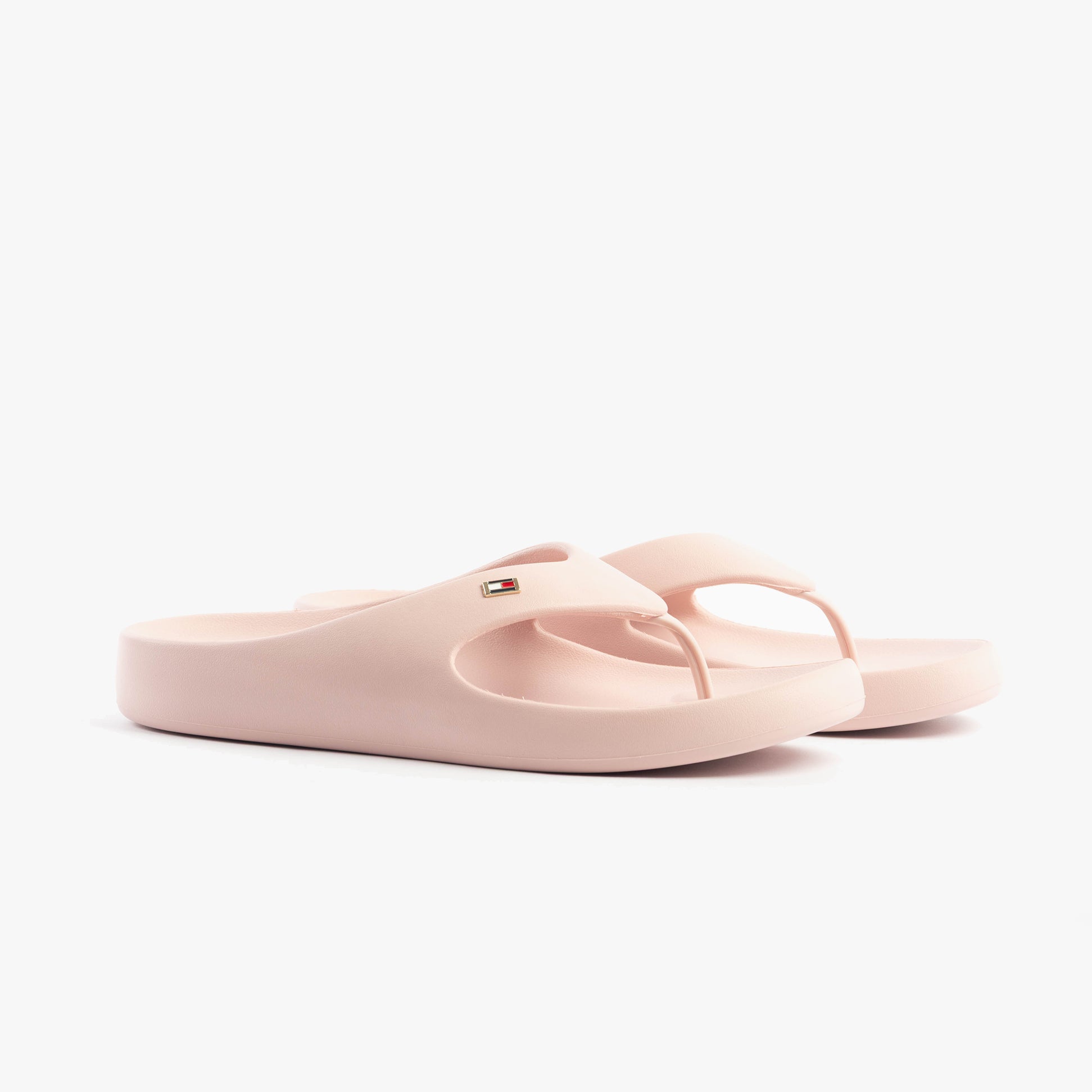 Tommy Hilfiger ENAMEL FLAG CONTOURED Womens Sandals Foggy Pink side view showcasing lightweight EVA material and slip-on design.