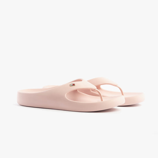 Tommy Hilfiger ENAMEL FLAG CONTOURED Womens Sandals Foggy Pink side view showcasing lightweight EVA material and slip-on design.