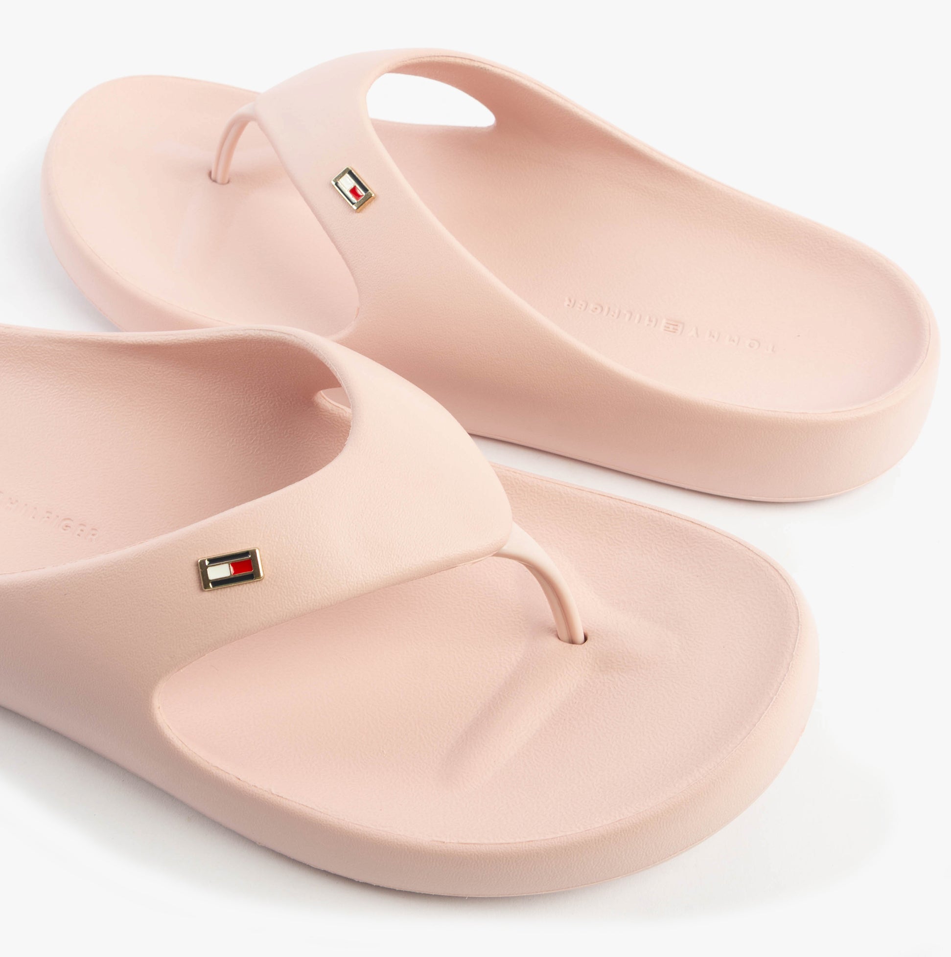 Tommy Hilfiger ENAMEL FLAG CONTOURED Womens Sandals Foggy Pink side view showing soft EVA material and signature logo.