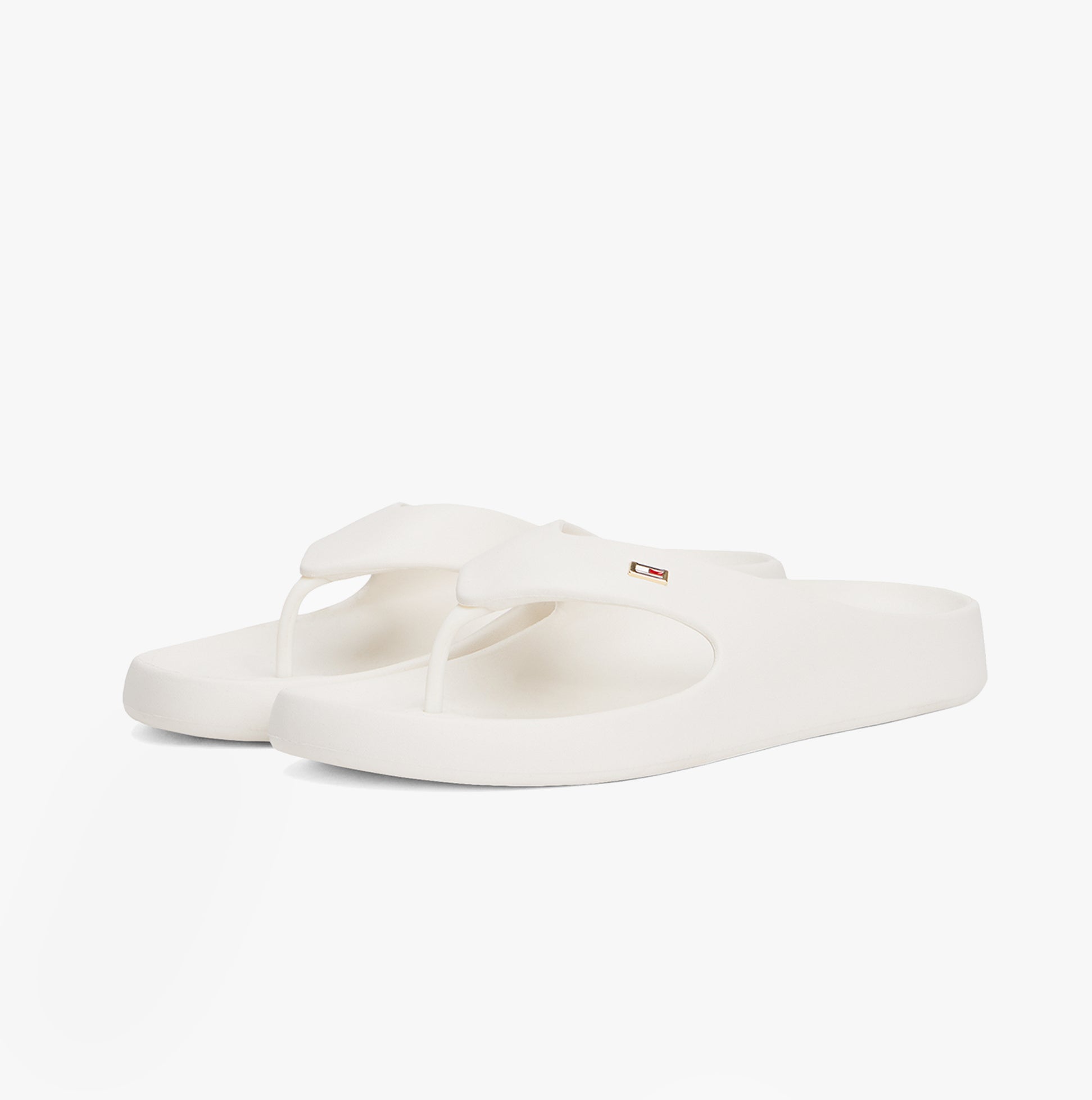 Tommy Hilfiger ENAMEL FLAG CONTOURED Womens Sandals Ancient White side view, showcasing lightweight EVA material and slip-on design.