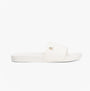 Tommy Hilfiger MONOGRAM POOLSIDE Womens Sliders White side view, featuring embossed TH monogram on strap.