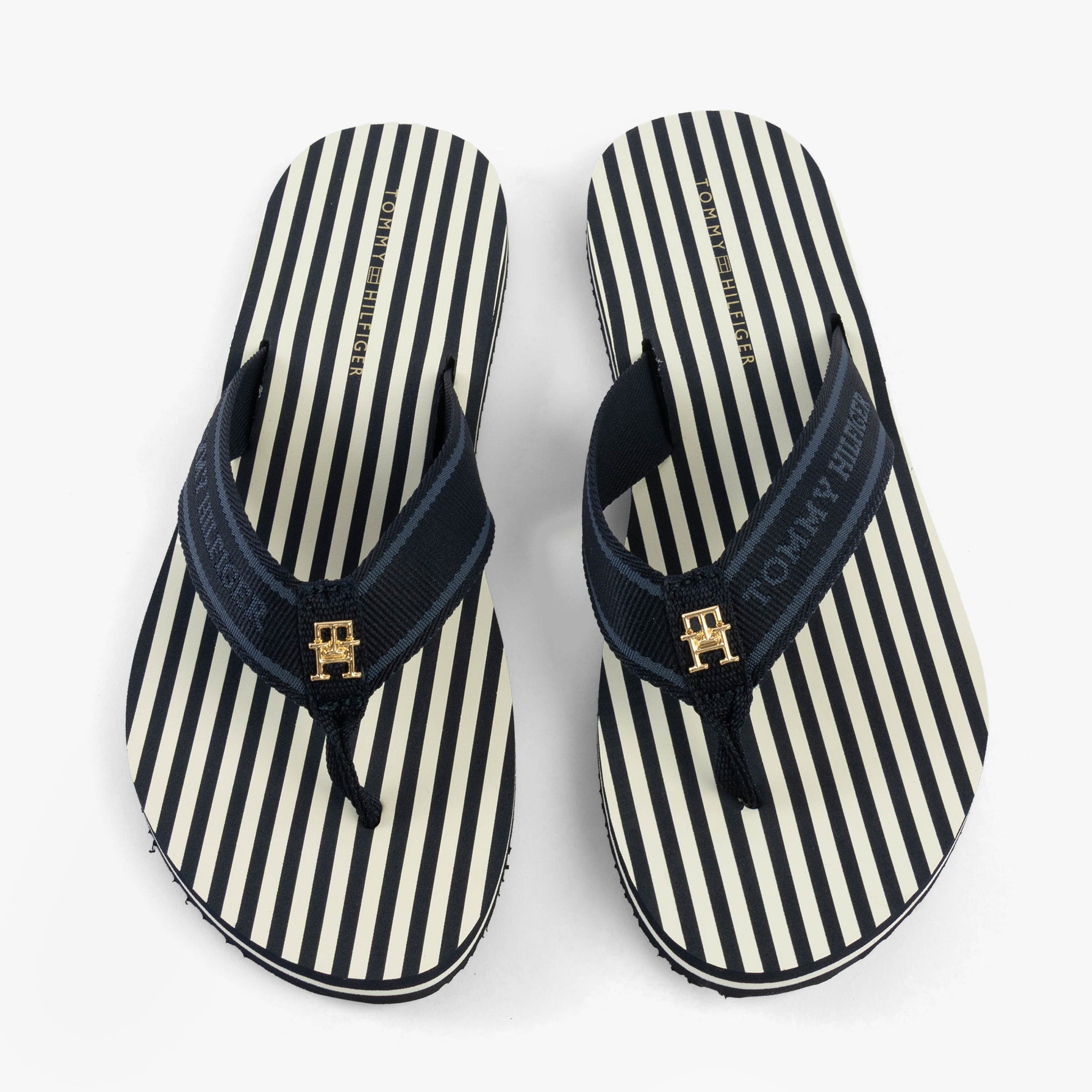 Tommy Hilfiger STRIPES LOGO Womens Flip-Flops Space Blue top view showcasing striped design and logo detail.