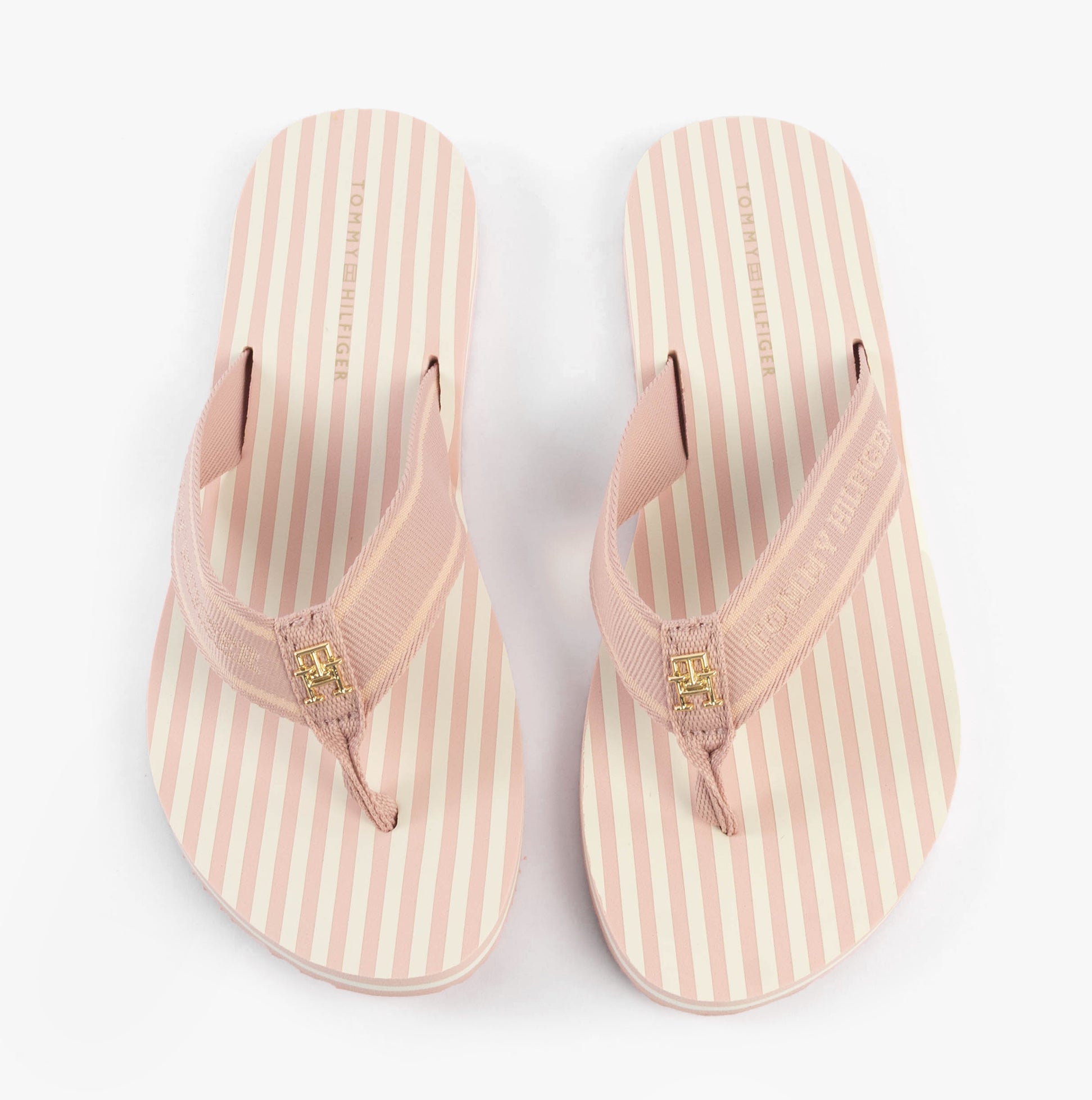 Tommy Hilfiger STRIPES LOGO Womens Flip-Flops Foggy Pink top view with striped pattern and logo detail.