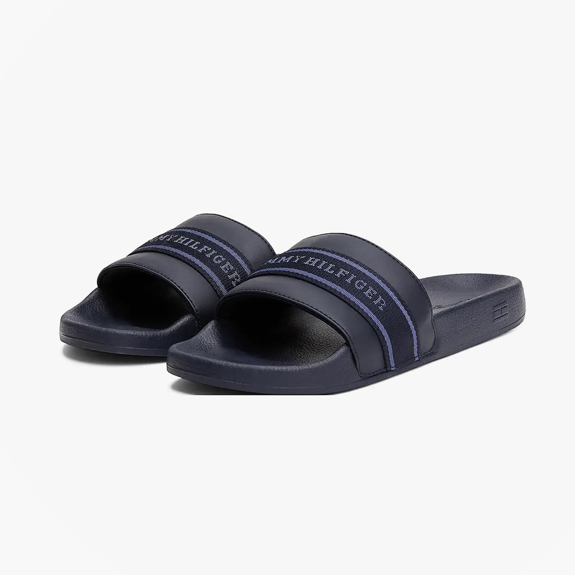 Tommy Hilfiger POOLSIDE Logo Webbing Sliders Navy side view showcasing the logo strap and EVA sole.