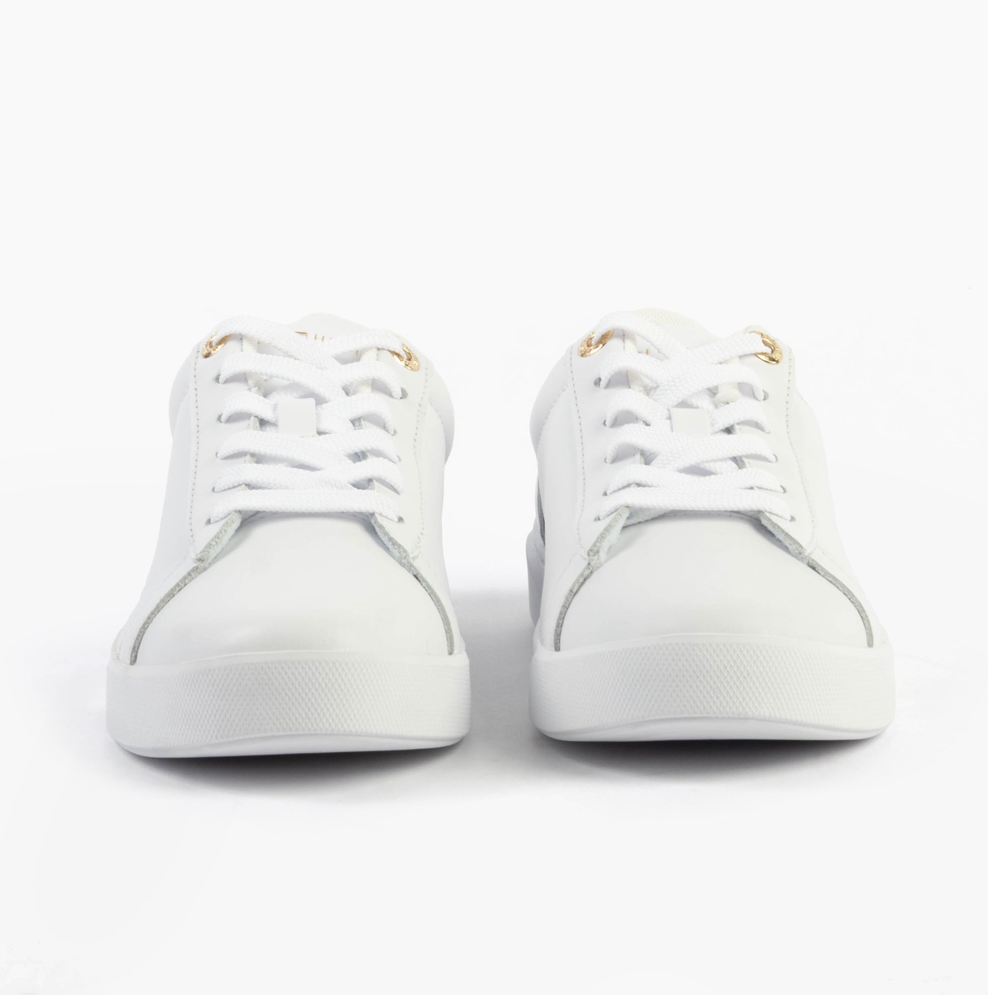 Tommy Hilfiger CHIC COURT SNEAKER Womens Trainers White front view featuring lace-up closure and leather upper.