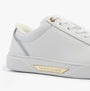 Tommy Hilfiger CHIC COURT SNEAKER Womens Trainers White side view showing leather upper and gold logo detail.