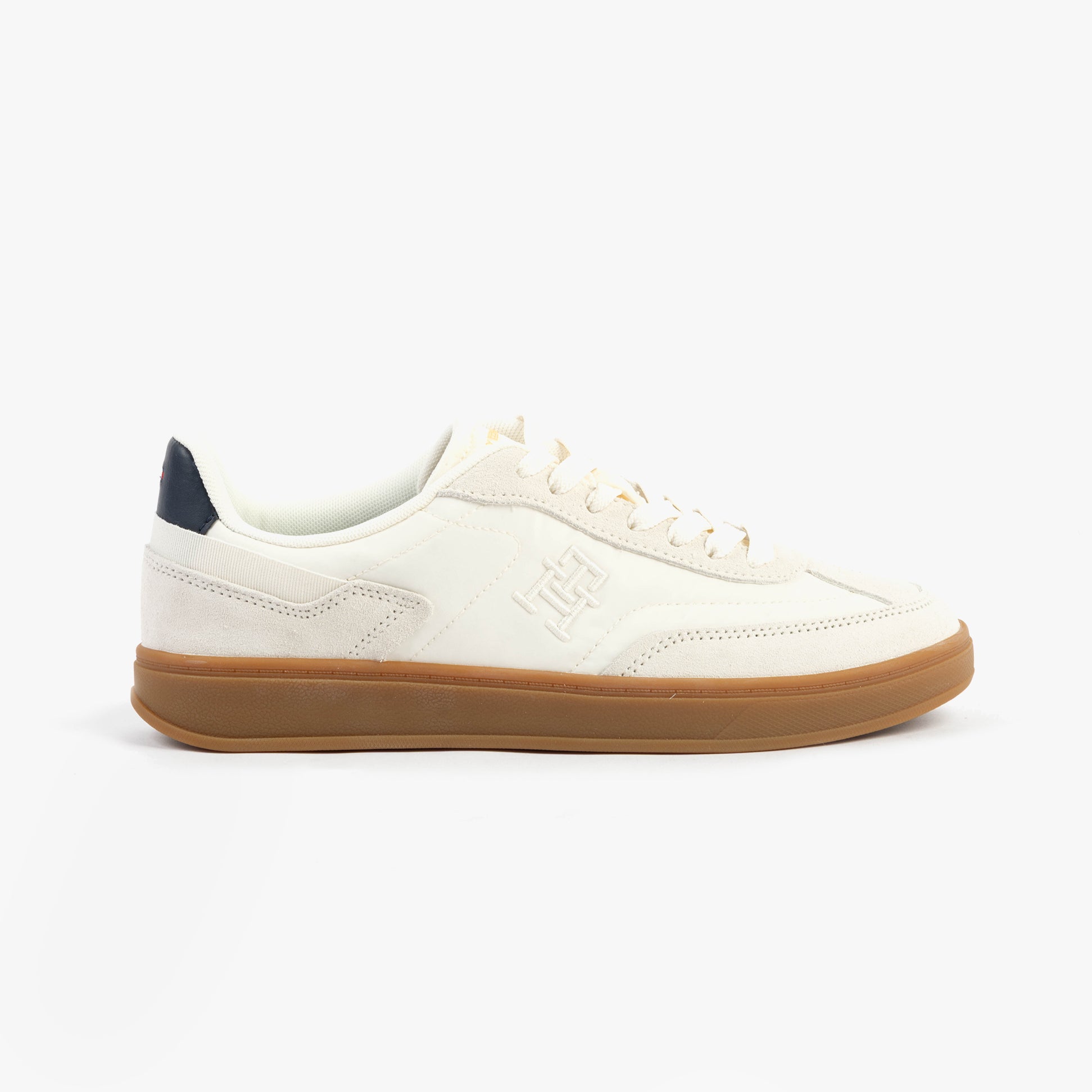 Tommy Hilfiger TH HERITAGE SNEAKER Womens Ancient White side view showing casual leather upper and rubber sole.
