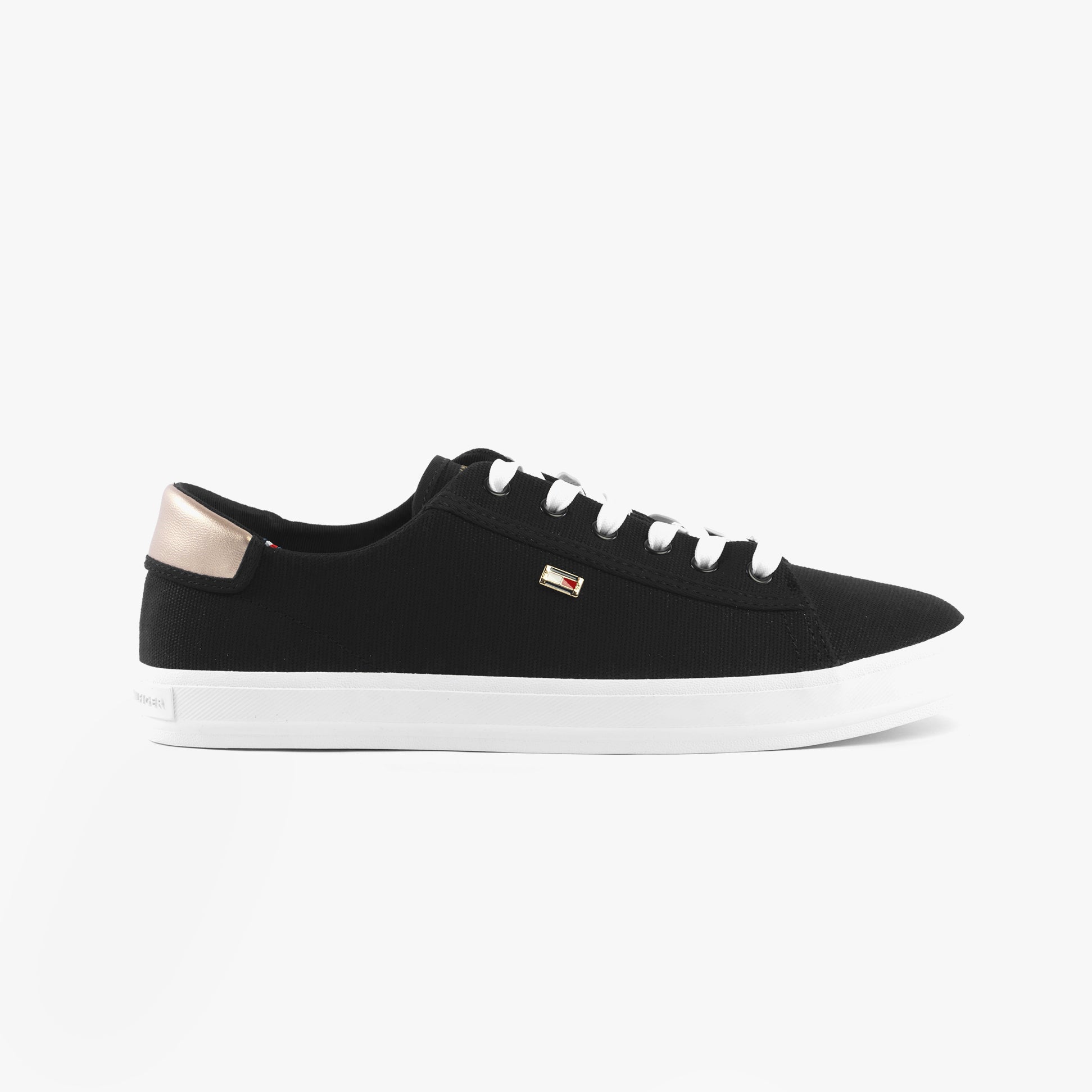 Tommy Hilfiger CANVAS METALLIC HEEL Womens Trainers Black side view showing canvas upper and metallic heel.