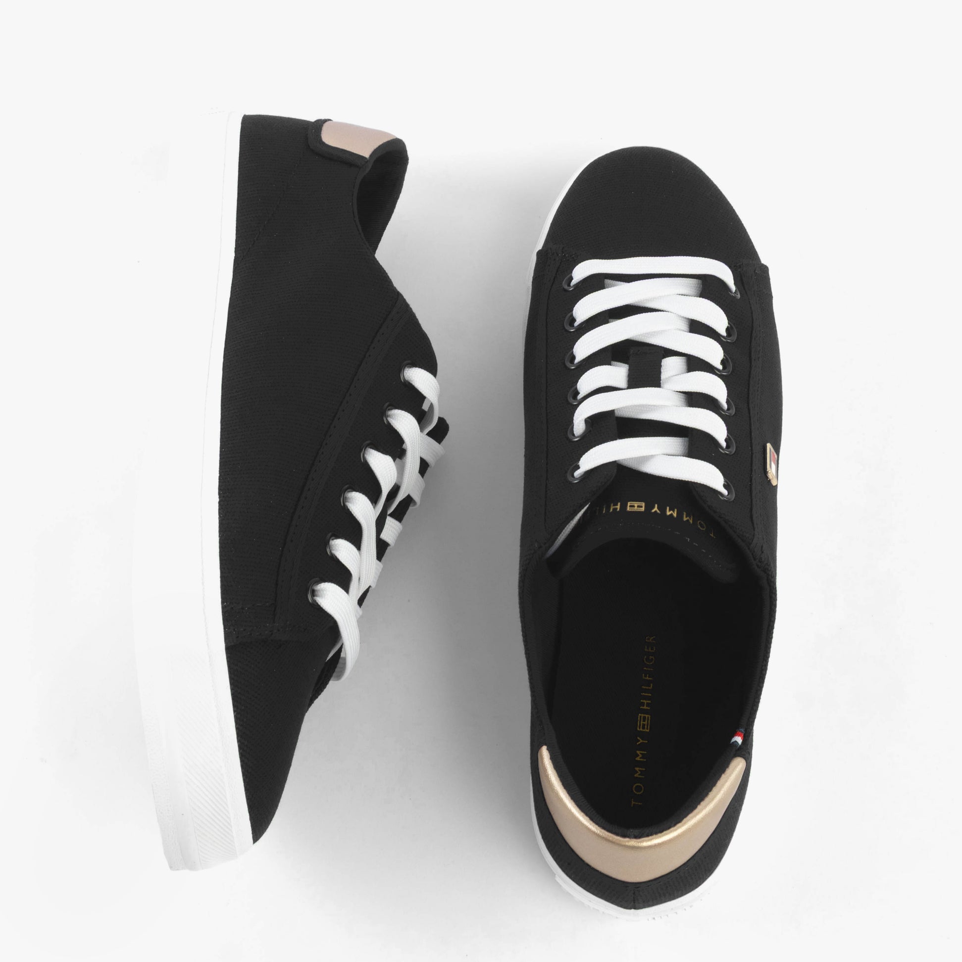 Tommy Hilfiger CANVAS METALLIC HEEL Womens Trainers Black, top view of stylish black trainers with lace-up design and metallic heel detail.