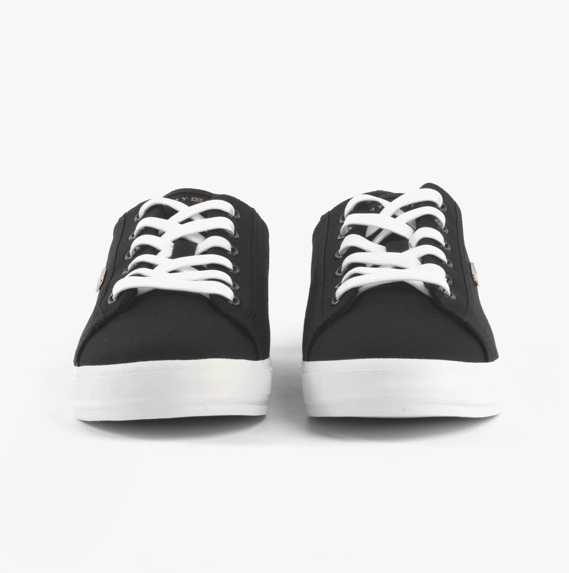 Tommy Hilfiger CANVAS METALLIC HEEL Womens Trainers Black front view showing lace-up closure and round toe design.
