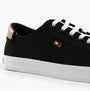 Tommy Hilfiger CANVAS METALLIC HEEL Womens Trainers Black side view with black canvas upper and gold accent.