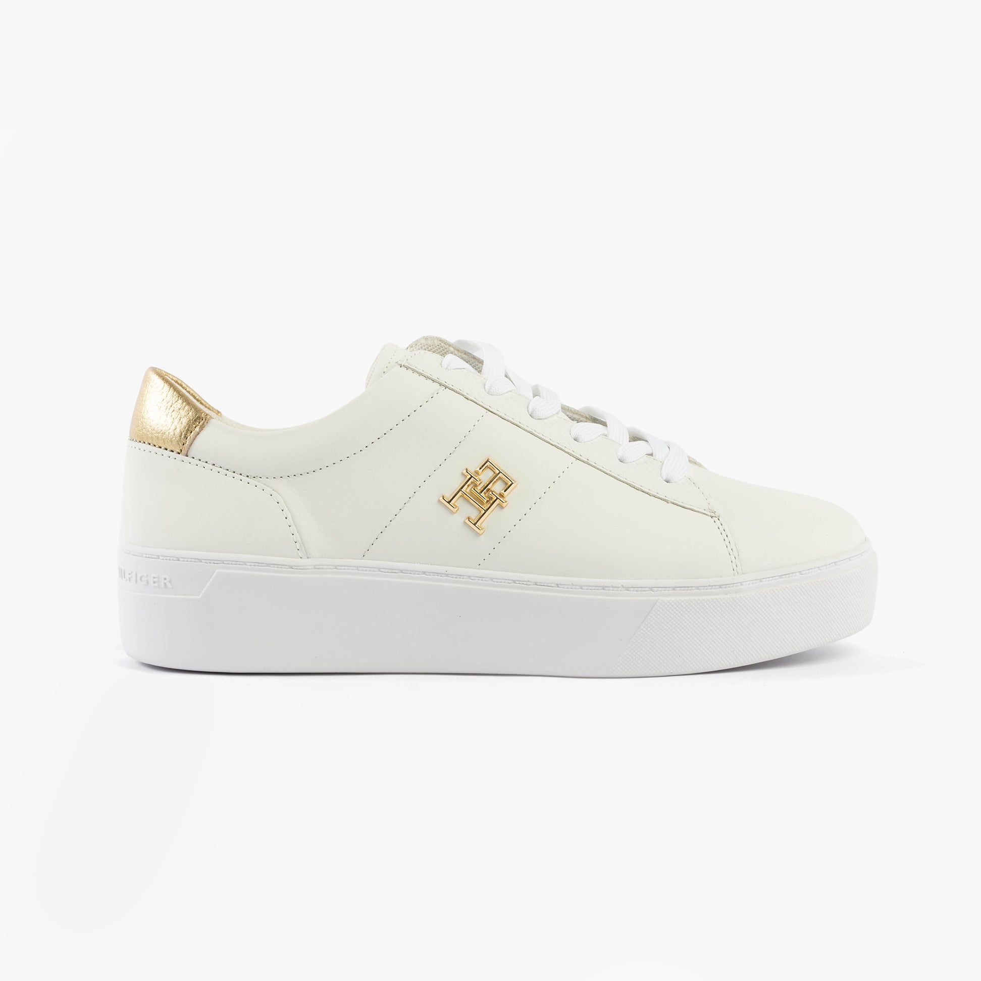 Tommy Hilfiger PLATFORM COURT Womens Trainers White side view showing leather upper and gold detailing.