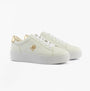 Tommy Hilfiger PLATFORM COURT Womens Trainers White side view with gold accents and white laces on a light background.