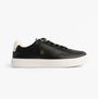 Tommy Hilfiger Womens Leather TH Monogram Plaque Court Trainers Black side view with lace-up closure and round toe.