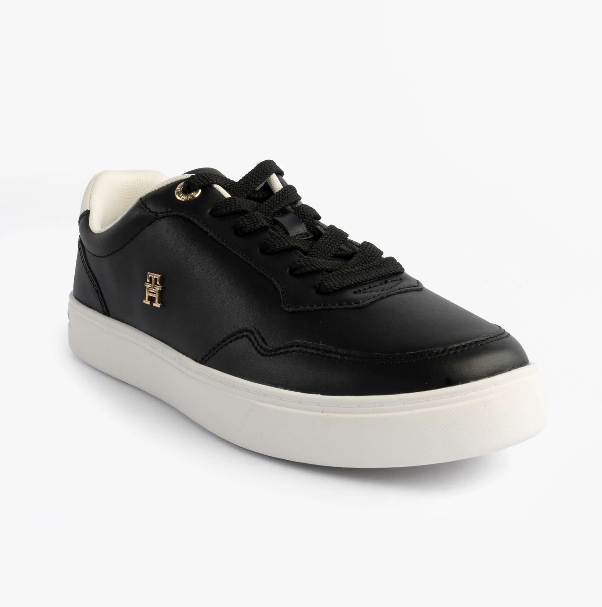 Tommy Hilfiger Womens Leather TH Monogram Plaque Court Trainers Black side view showing sleek design and logo detail.