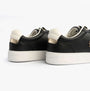 Tommy Hilfiger Womens Leather TH Monogram Plaque Court Trainers Black back view showcasing sleek design and color contrast.
