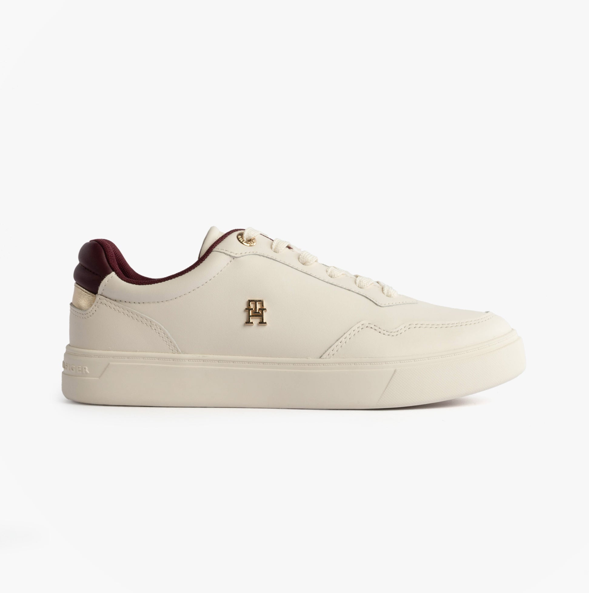 Tommy Hilfiger ELEVATED COURT SNEAK Womens Court Trainers Trainers Ancient White side view showcasing leather upper and lace-up design.