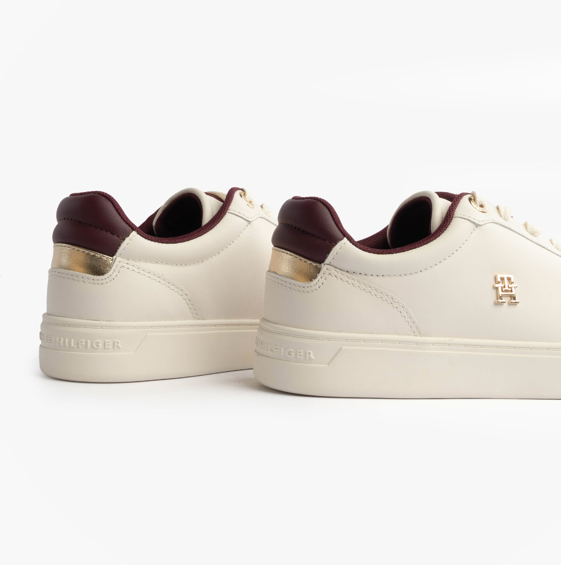 Tommy Hilfiger ELEVATED COURT SNEAK Womens Court Trainers Trainers Ancient White, back view showing leather upper and gold accents.