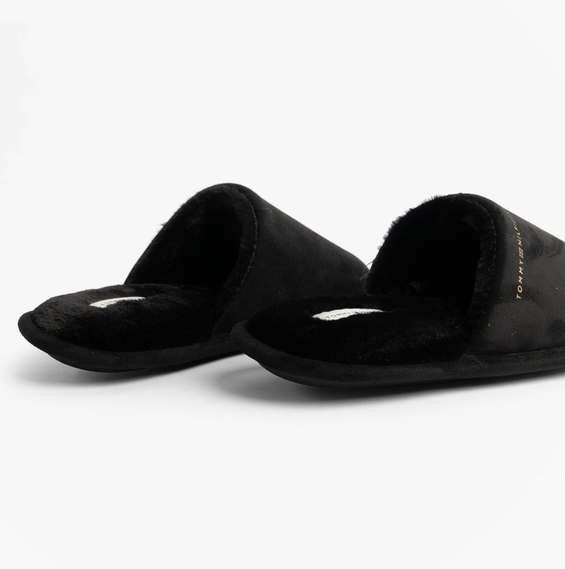Tommy Hilfiger TH SOFT HOUSE SHOE Womens Slippers Black side view with soft textile upper and slip-on design.