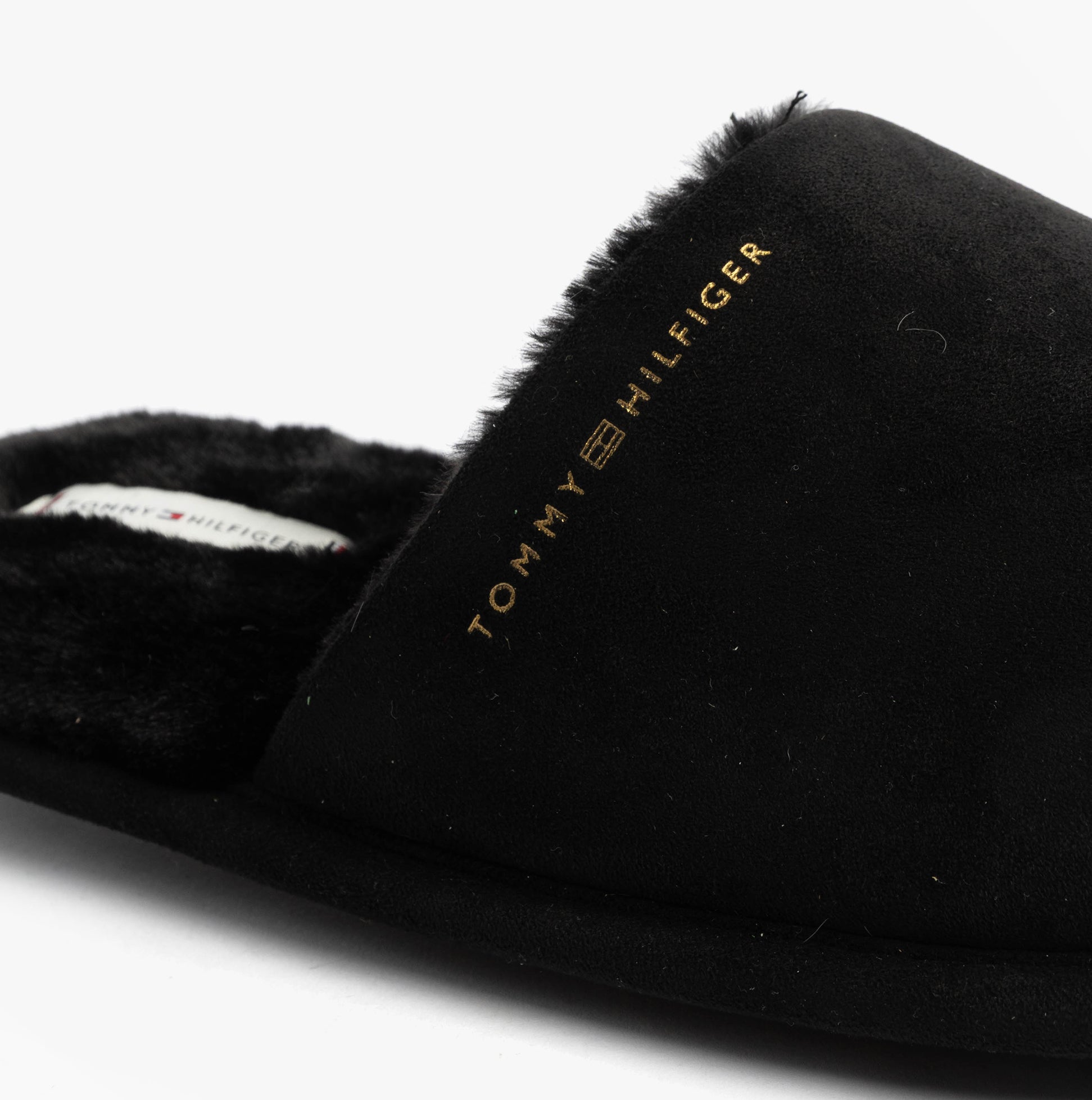 Tommy Hilfiger TH SOFT HOUSE SHOE Womens Slippers Black detail view featuring plush lining and logo