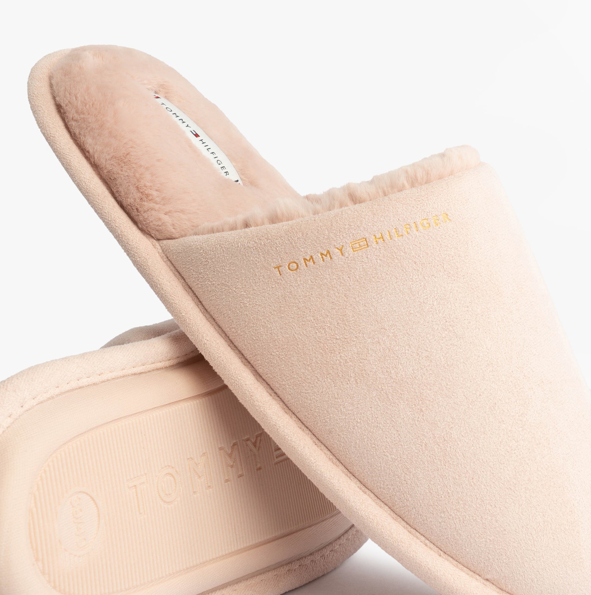 Tommy Hilfiger TH SOFT HOUSE SHOE Womens Slippers Misty Bluesh detail view of plush mules in light color with logo.