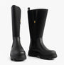 Tommy Hilfiger FLAG LONG RAINBOOT Womens Boots Black side and front view showcasing the rubber upper and chunky sole.