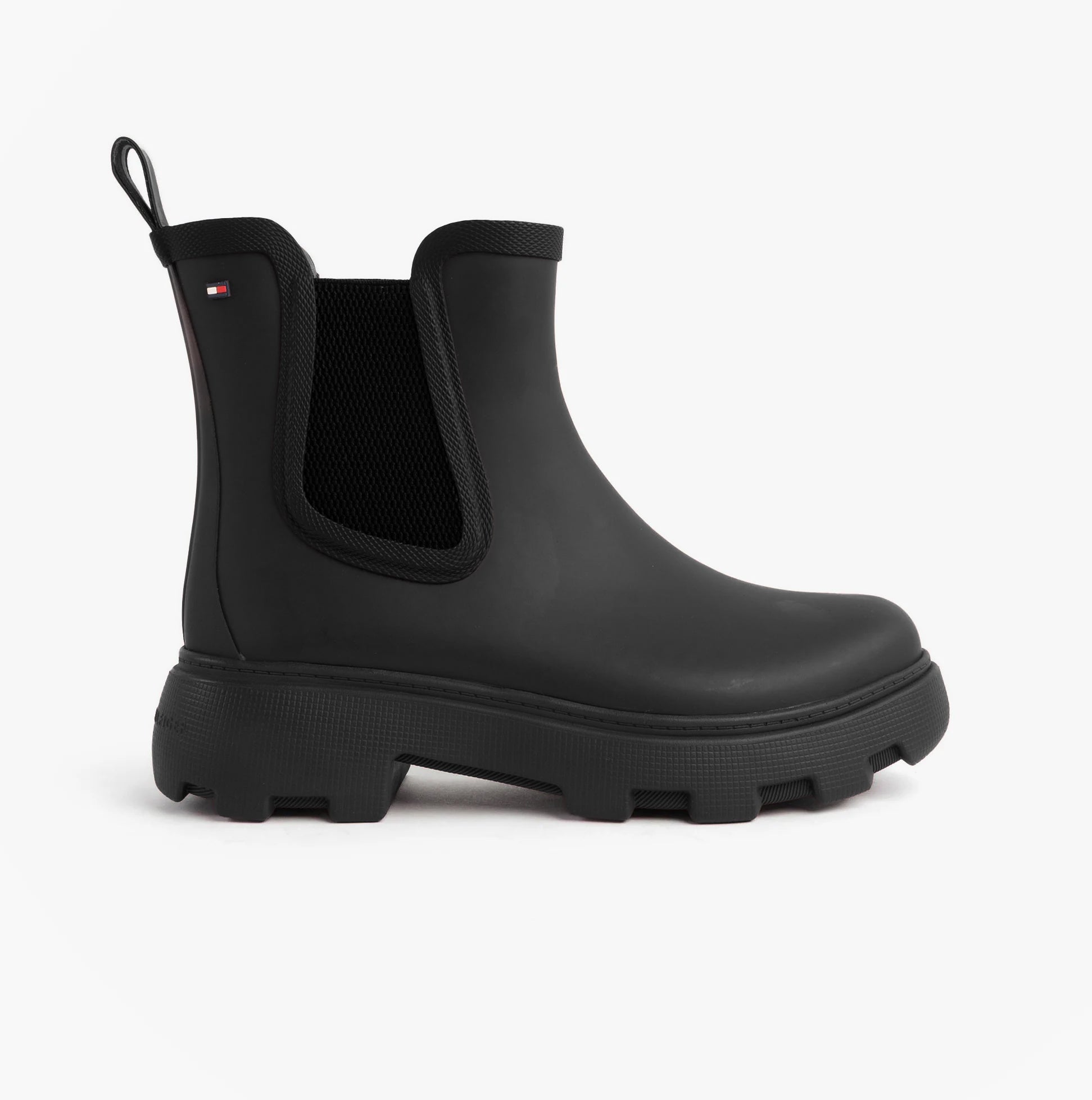 Tommy Hilfiger ANKLE RAINBOOT Womens Boots Black side view showing rubber upper and elasticated side panel.