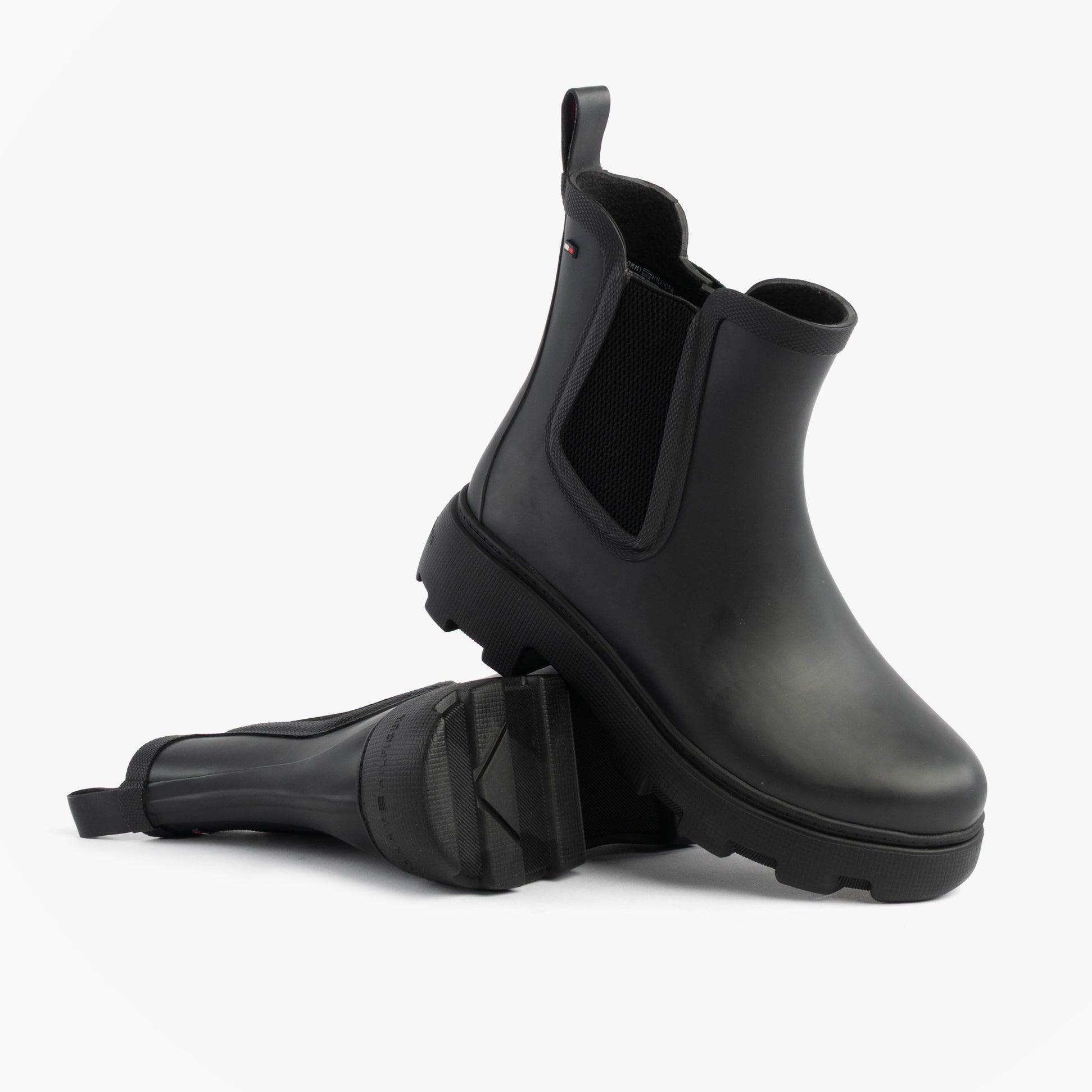 Tommy Hilfiger ANKLE RAINBOOT Womens Boots Black side view showcasing the durable rubber material and elasticated side panels.