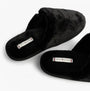 Tommy Hilfiger TH FAUX FUR HOUSE SH Womens Slippers Black top view showcasing soft faux fur and slip-on design.