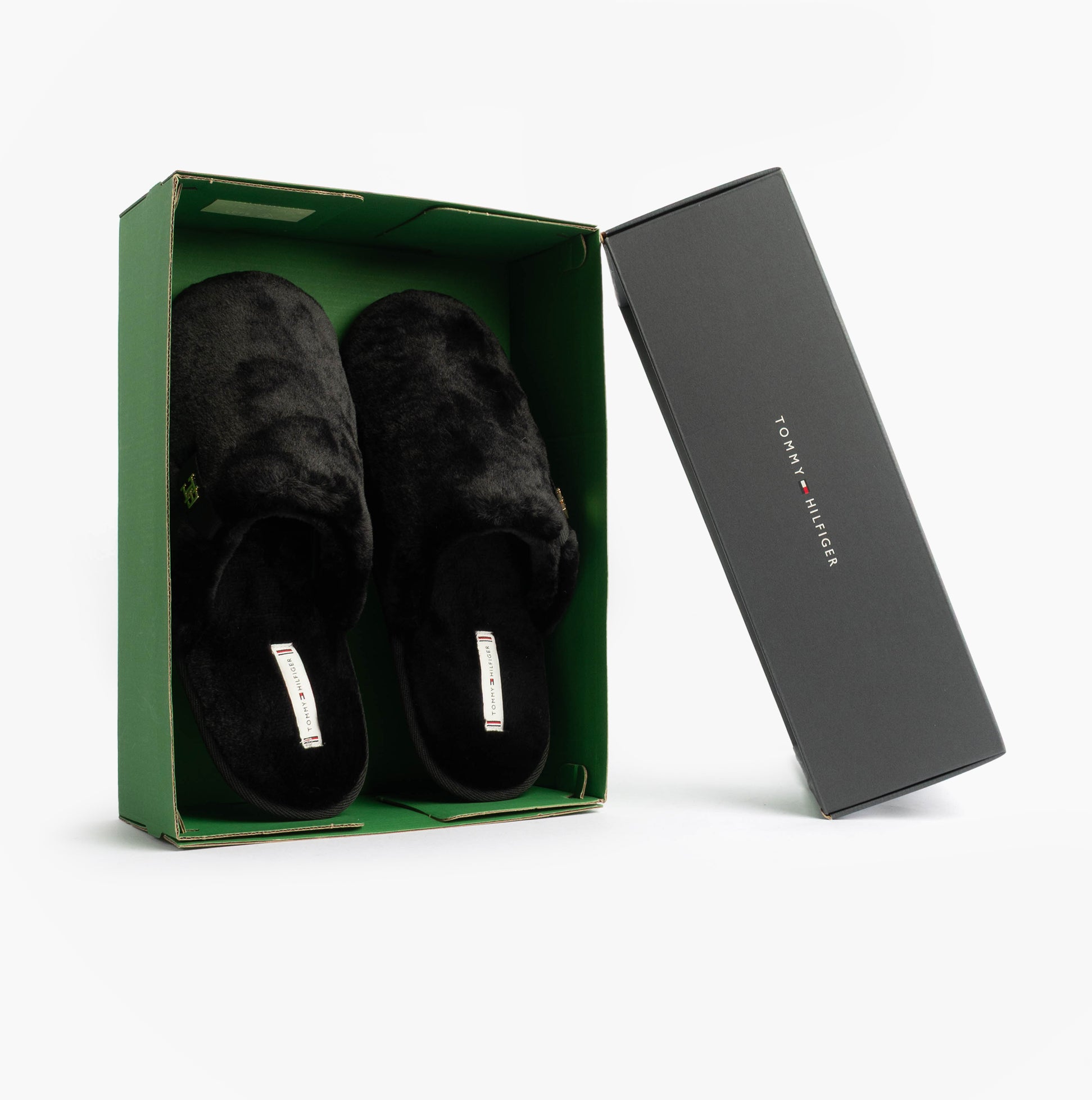 Tommy Hilfiger TH FAUX FUR HOUSE SH Womens Slippers Black in gift box, side view showing plush faux fur design.
