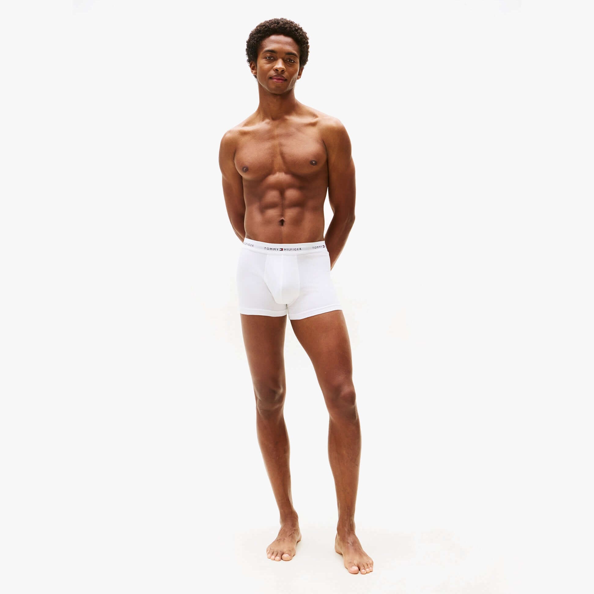 Tommy Hilfiger 3 Pack Trunk Mens White, front view of model wearing white trunks, showcasing style and fit.