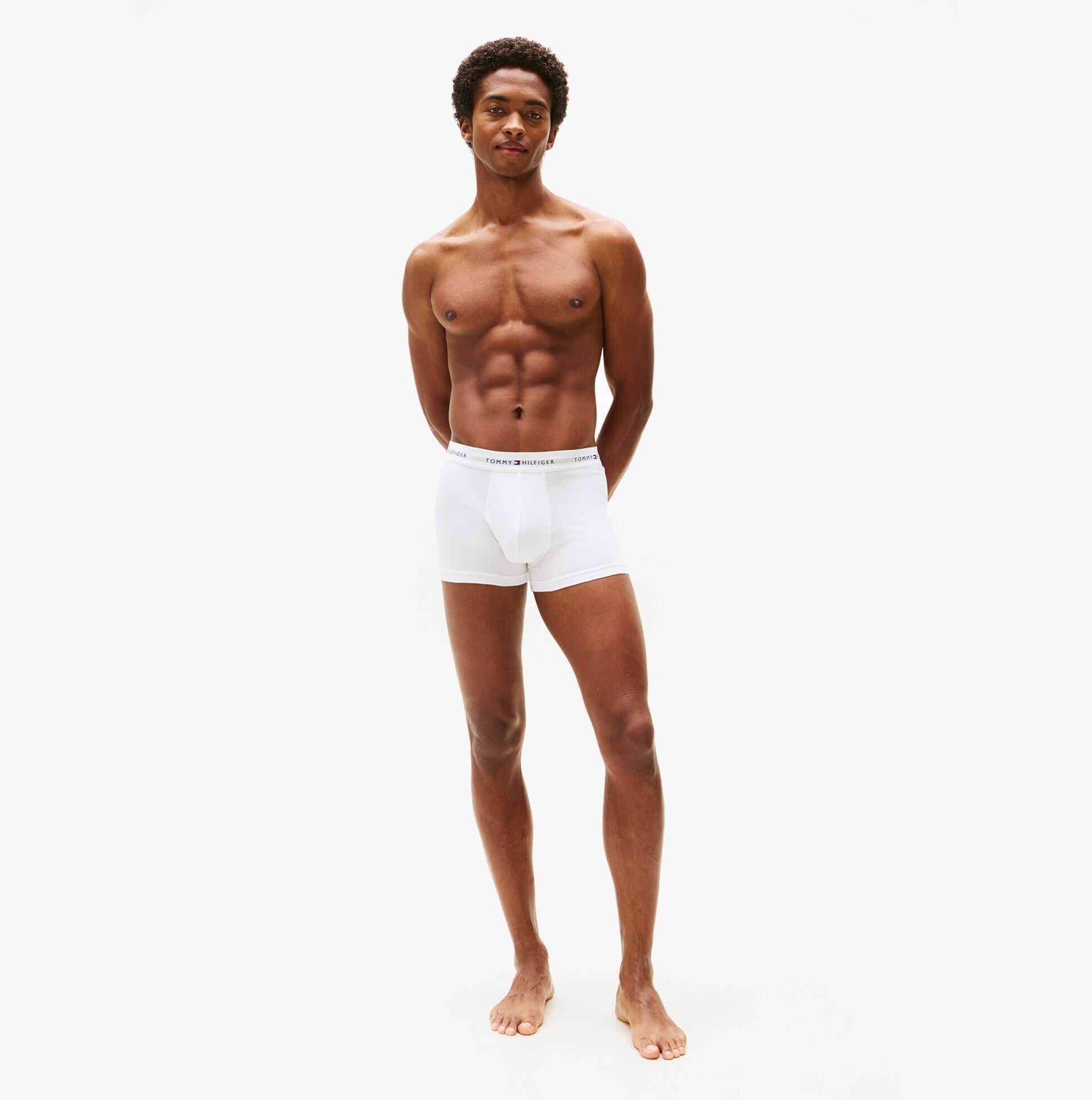 Tommy Hilfiger 3 Pack Trunk Mens White, front view of model wearing white trunks, showcasing style and fit.
