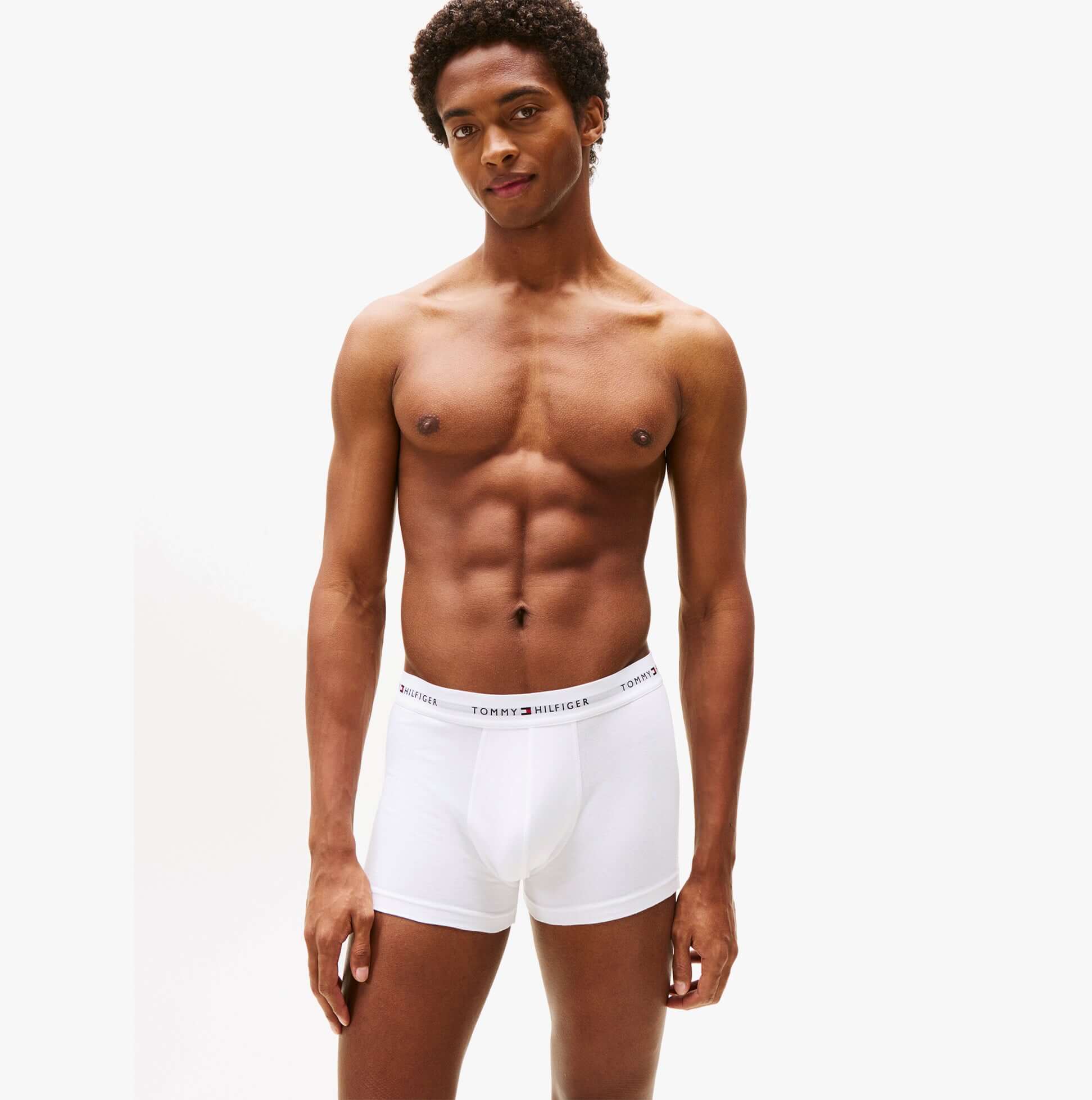 Tommy Hilfiger 3 Pack Trunk Mens White front view on model, showing fit and design with signature waistband.