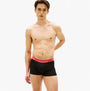 Tommy Hilfiger Mens 3 Pack Signature Repeat Logo Waistband Trunks black front view on model, showcasing waistband detail.