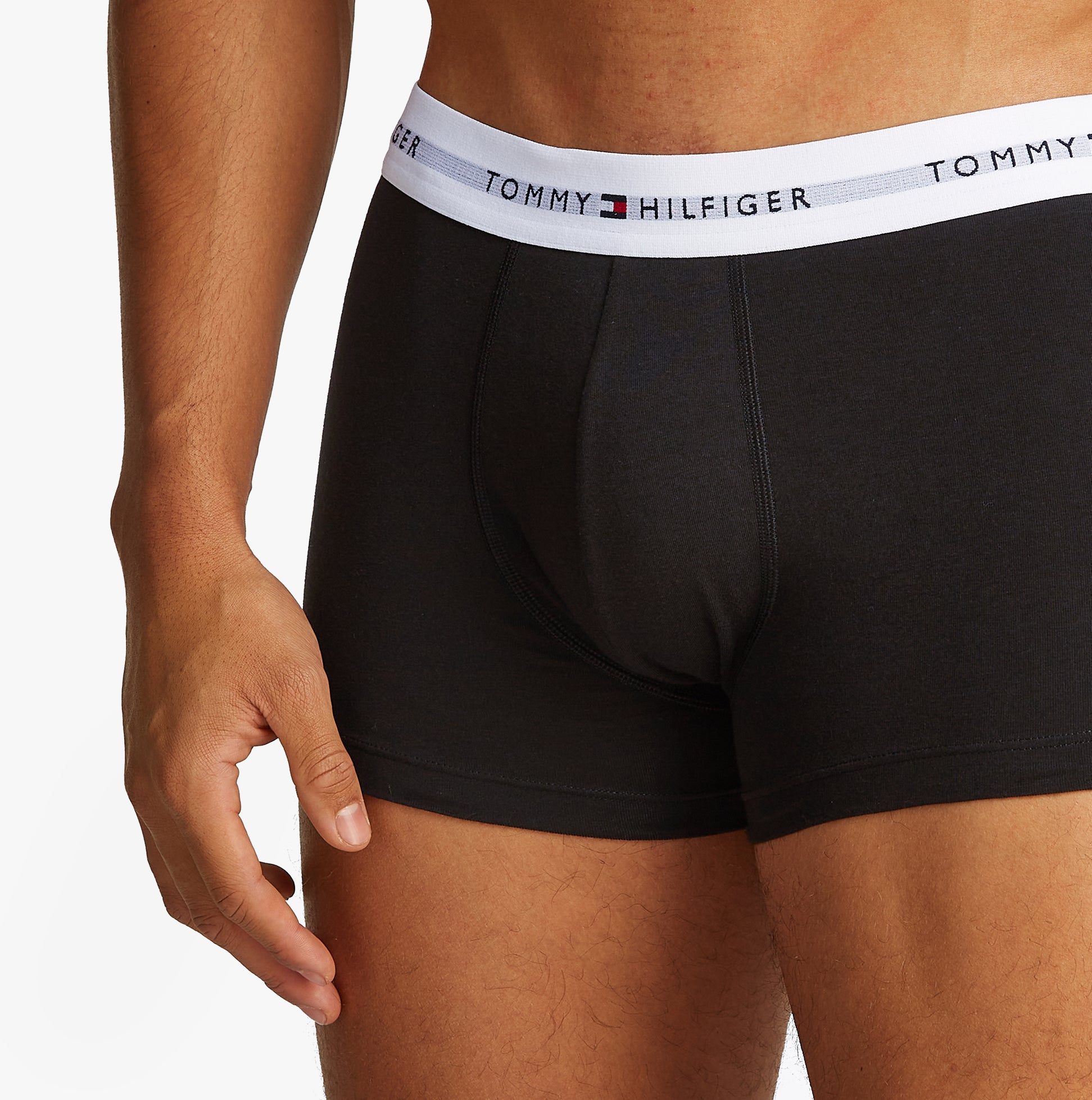 Tommy Hilfiger 3 Pack Mens Colour-Blocked Logo Trunks Black side view featuring elasticated waistband and body fit.