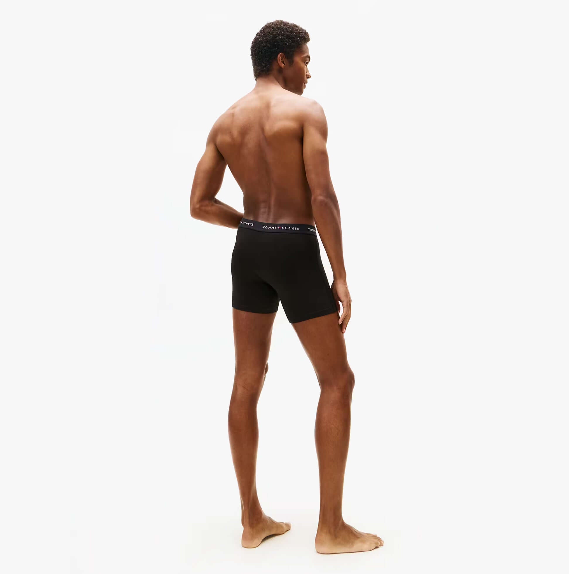 Tommy Hilfiger 3 Pack Mens BOXER BRIEF Black, model viewed from the back, showcasing the fit and design details.